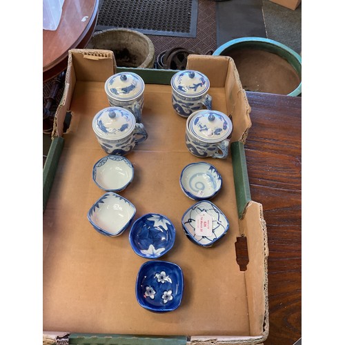 626 - Four Oriental blue and white lidded mugs and six tea bowls