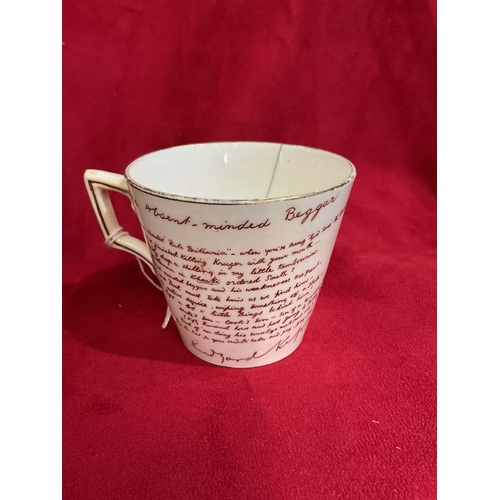 25 - A Macintyre 'The Absent Minded Beggar' cup A/F and a Crown Devon rouge royal ginger jar