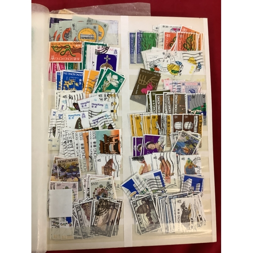 138 - An album housing a large quantity of Hong Kong stamps ''Lunar New Year', 'Olympics', etc