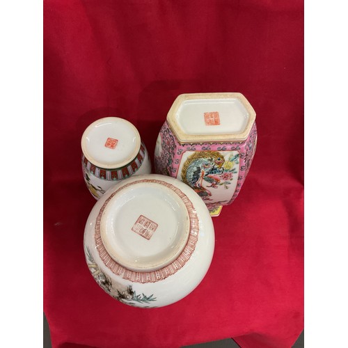 34 - Three Chinese famille rose vases with character marks to base