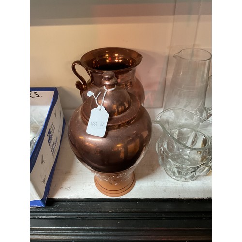 438 - A copper lustre glazed pottery ginger jar and vase