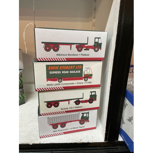 449 - Four boxed as new Atlas Edition Eddie Stobart lorries to include 'Atkinson Borderer Flatbed', 'MAN L... 