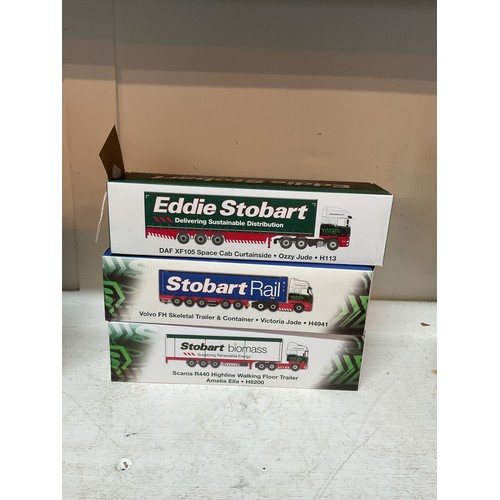 450 - Three boxed as new Atlas Edition Eddie Stobart lorries to include 'DAF XF105 Space Cab Curtainside O... 