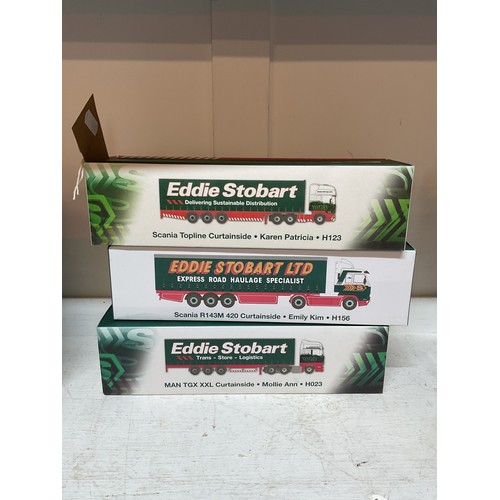 451 - Three boxed as new Atlas Edition Eddie Stobart lorries to include 'Scania Topline Curtainside Karen ... 