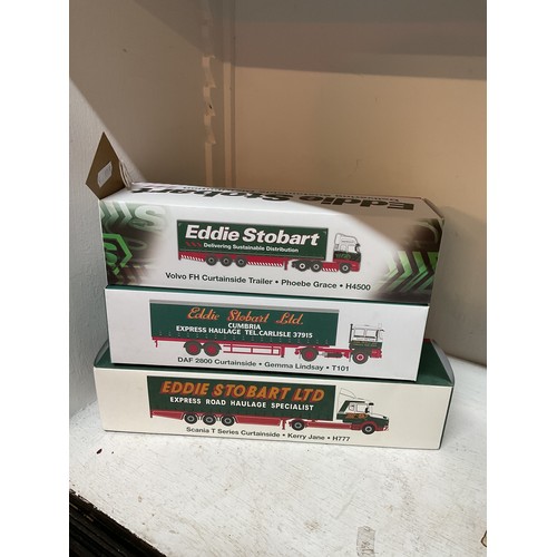 453 - Three boxed as new Atlas Edition Eddie Stobart lorries to include 'Volvo FH Curtainside Trailer Pheo... 