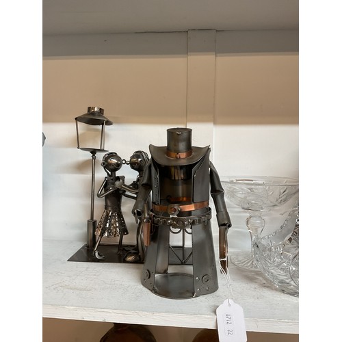 457 - Two metal work wine holder one in the form of a cowboy and the other a couple dancing