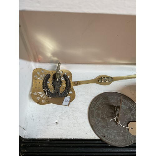 465 - A vintage brass strainer together with a horse shoe door knocker