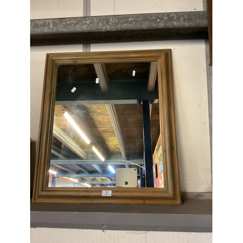 489 - A pine framed mirror