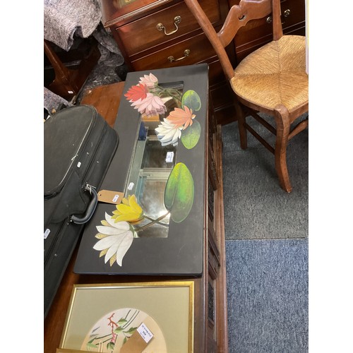 493 - A mirror with painted water lily decoration