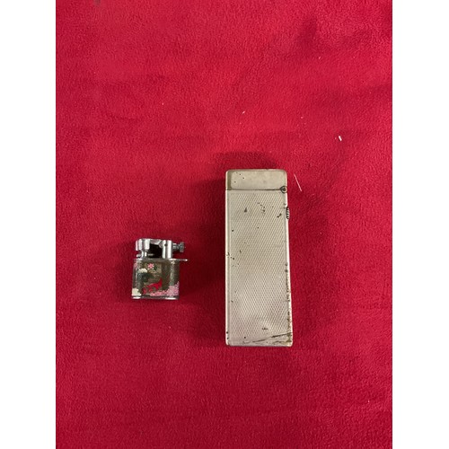 166 - A vintage 'Dunhill' lighter and a 'Muse' Japan enamelled miniature lighter