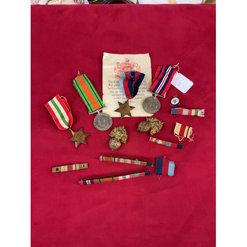 169 - A group of WWII replacement medals to include Star, Italy Star, War and Defence medal with paperwork... 