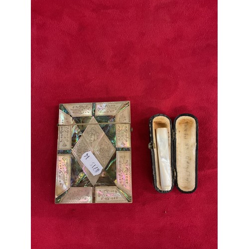 171 - A vintage mother of pearl and abalone card case and a mother of pearl cheroot holder
