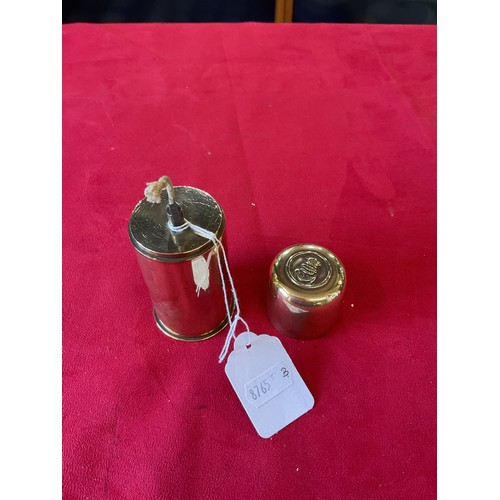 142 - A vintage brass WWI petrol lighter with a naval crest made from a shell case