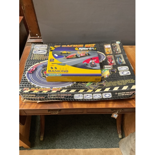 A boxed F1 Racing Set and Banking Track System