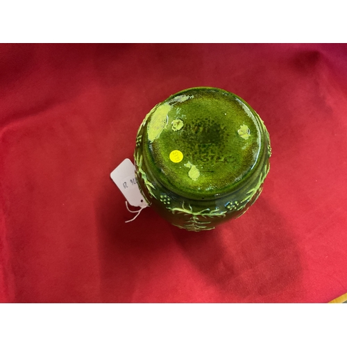 23 - A Rye Pottery green glazed vase with two ringed handles and fern decoration signed to base Masters 5... 