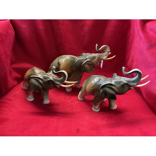 67 - A group of three Royal Dux elephant's A/F