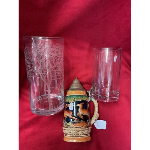 74 - Two glass vases and a beer stein