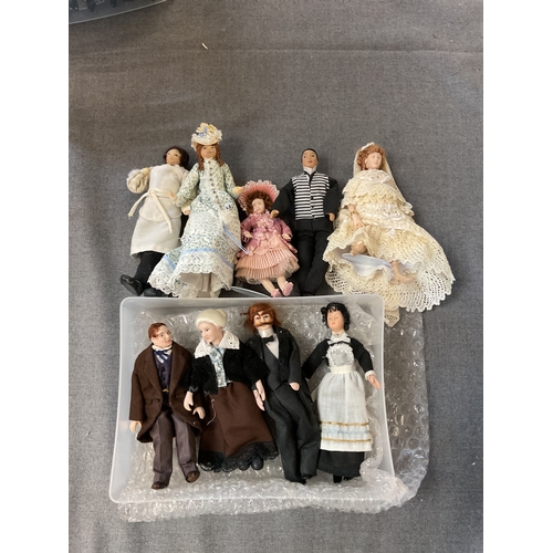 97 - Nine assorted dolls house figurines to include wooden and bisque examples