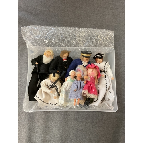 102 - Eight assorted dolls house figurines to include wooden examples etc