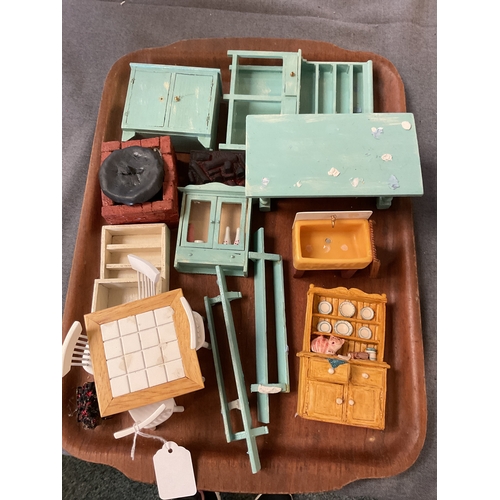105 - A mixed selection of shabby chic dolls house furniture to include dresser, table and chairs etc