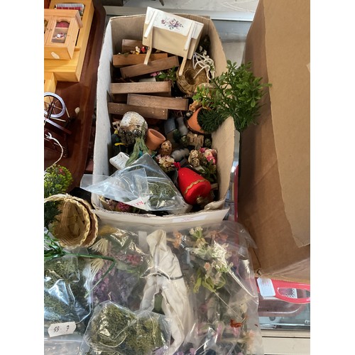 107 - A mixed selection of garden related dolls house accessories