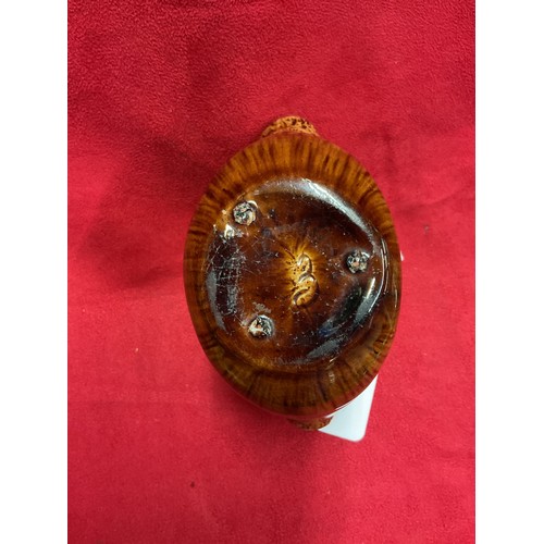 6 - A Bognor Pottery brown glazed miniature carpenter's bag with rope twist handle