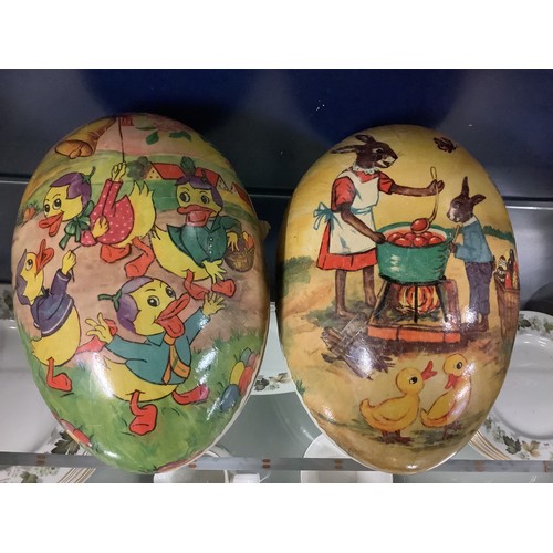 66 - Two vintage German papier-maché Easter egg candy container's