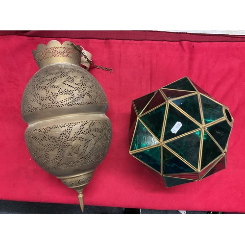 106 - A Middle Eastern ceiling lamp together with a green and brass ceiling lamp