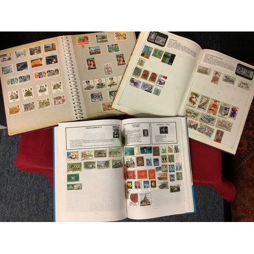 112 - Three albums housing a mixed selection of stamps if the World to include Great Britain, Hungary, Ind... 