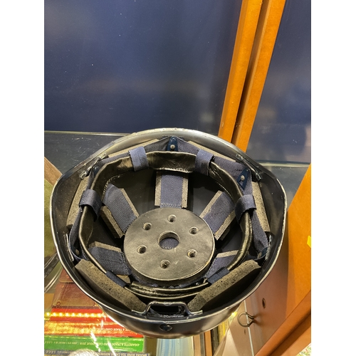 100 - A black painted French’s helmet