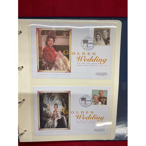 176 - The Royal Family stamp and coin album