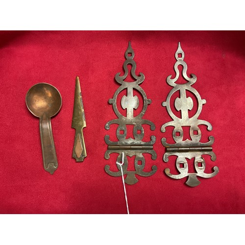 193 - A pair of vintage brass hinges, a copper ladle spoon and a letter opener