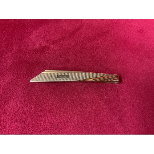 201 - A rolled gold tie/scarf clip, 6.8 grams