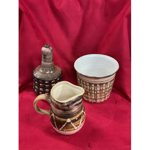 46 - A David Sharp of Rye brown glazed lamp, water pitcher and jardinière