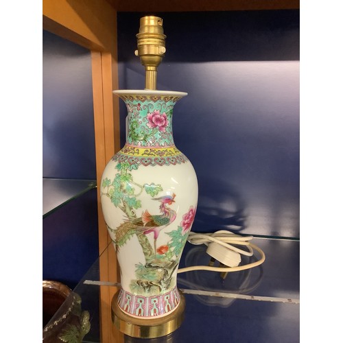 63 - A Chinese famille rose vase having peacock and floral decoration now converted to a table lamp fully... 