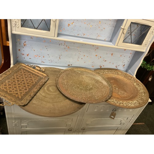 320 - Four vintage brass trays