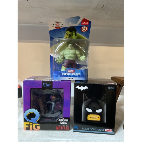 323 - A Boxed Disney Infinity Marvel Super Hero 'The Hulk' together with a boxed Marvel 'Jessica Jones' fi... 