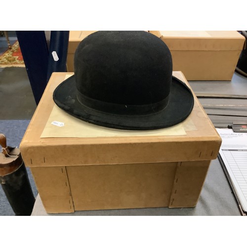 326 - A boxed vintage bowler hat size 7