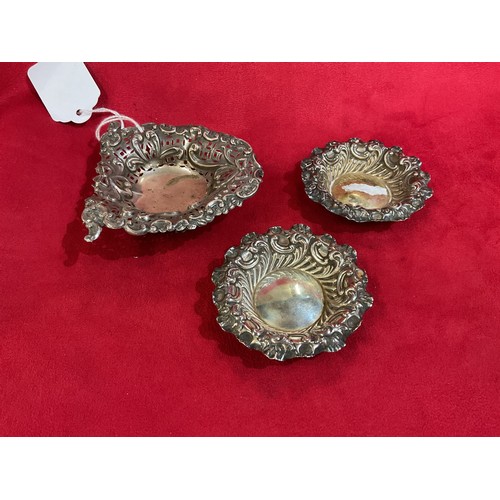 167 - A pair of Sheffield 1895 silver salt dishes with scroll and fluted decoration and a similar London 1... 