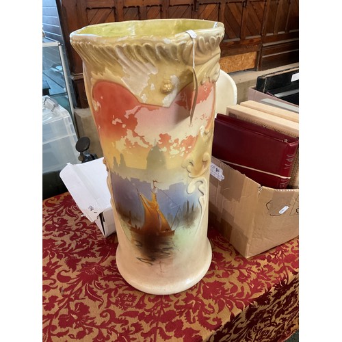 298 - A vintage pottery stick stand made by Bretby decorated with a sailing boat scene