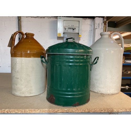 301 - Two vintage stone-ware flagons together with a small green painted dustbin