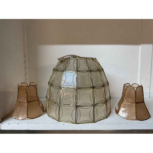 312 - A vintage gold frame Capiz shell pendant lamp shade and two small lamp shades