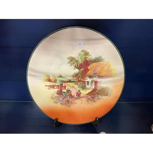 320 - A Royal Doulton Rustic England series ware plate D6297