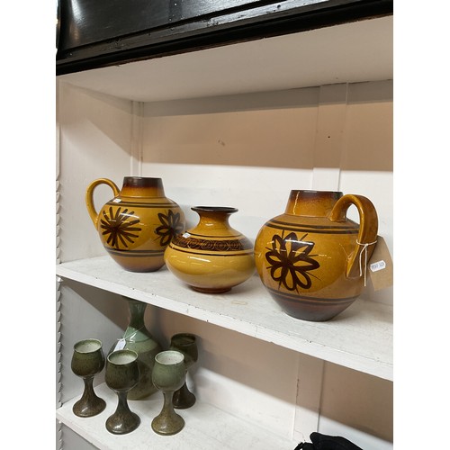 321 - A pair of Cinque Ports Pottery jugs and vase