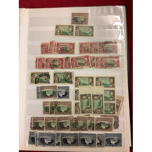 350 - An album housing a selection of mint and used stamps from Southern Rhodesia