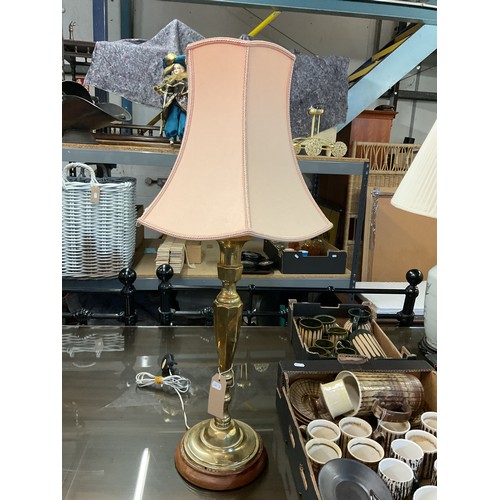 344 - A large brass table lamp resting on wooden base