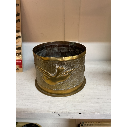 332 - A WWII German trench art shell casing with bird and floral decoration