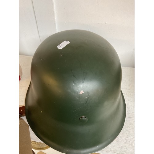 329 - A WWII German re-enactment/film prop helmet