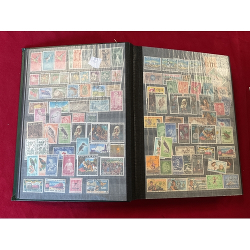 289 - An album housing a large collection of New Zealand stamps
