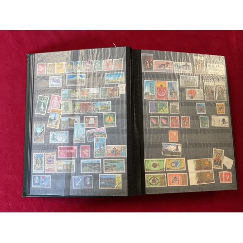 289 - An album housing a large collection of New Zealand stamps